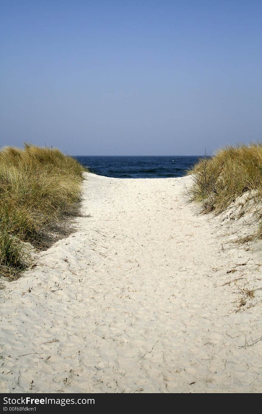 Pathway in dune with blue sky. Pathway in dune with blue sky