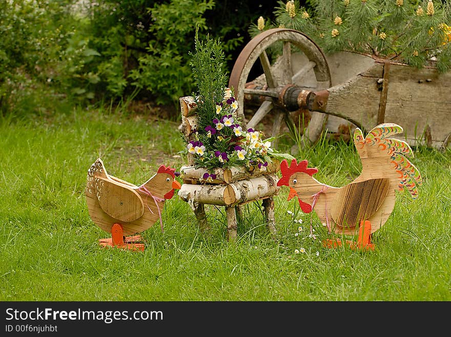 Rooster and hen in the garden