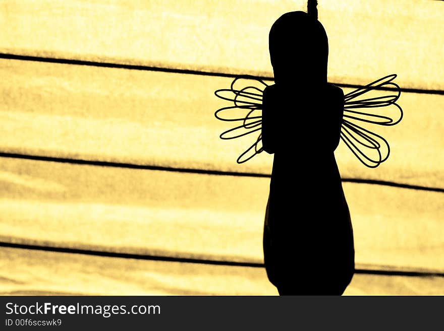 Backlit angel silhouette
christmas decorations