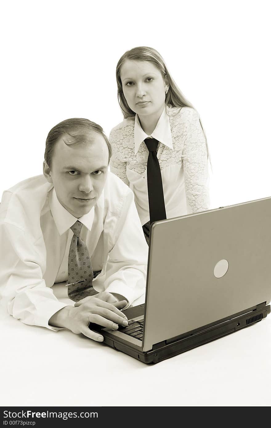 Group of business people working together. Shot in studio. Group of business people working together. Shot in studio.