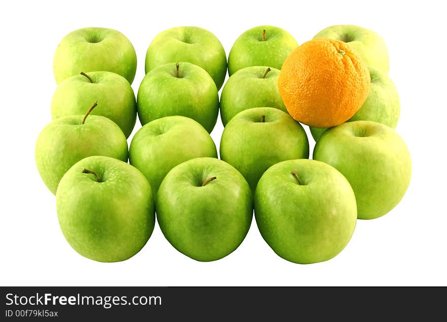 Green apples and an orange