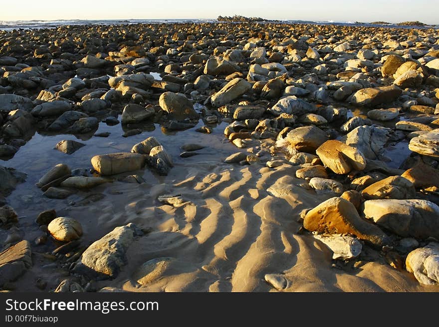 Rockshapes with sunrise at lowtide. Rockshapes with sunrise at lowtide