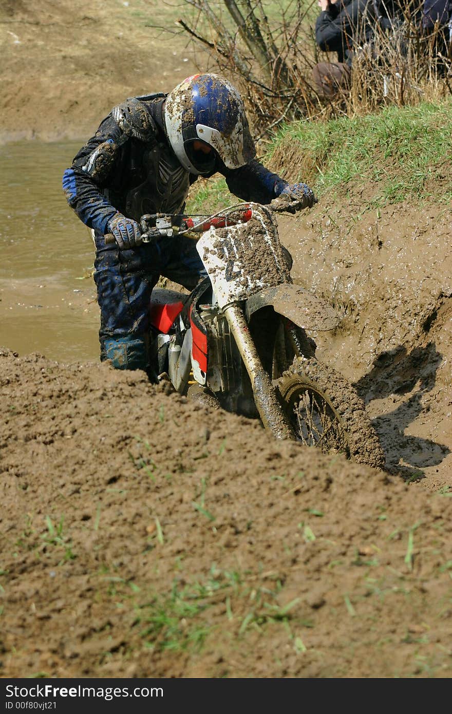 Motorcycle race on a cross-country terrain. Motorcycle race on a cross-country terrain.