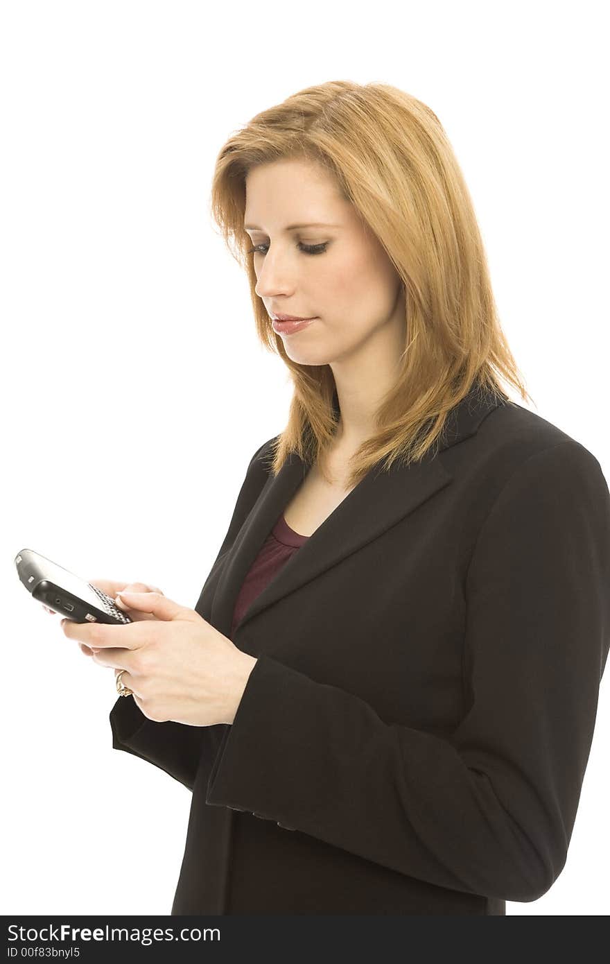 Businesswoman texts with her thumbs on a mobile device. Businesswoman texts with her thumbs on a mobile device