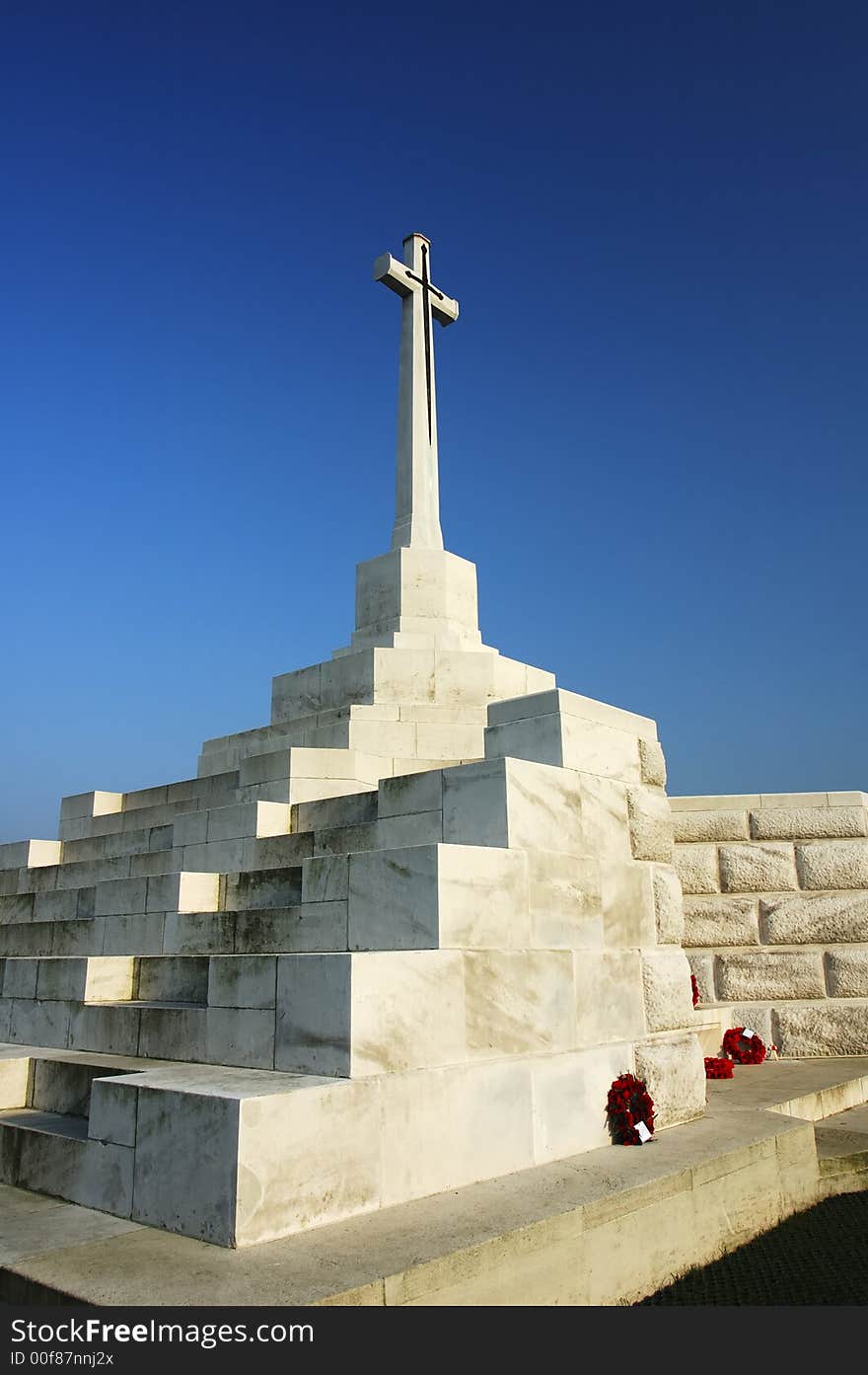 The memorial at Tyne Cot military cemetery, the largest military cemetery in continental Europe. 11'956 soldiers from the First World War are buried in it. On the rear wall are engraved the names of a further 34'957 who were killed in the last year of the war but whose bodies were never found. The memorial at Tyne Cot military cemetery, the largest military cemetery in continental Europe. 11'956 soldiers from the First World War are buried in it. On the rear wall are engraved the names of a further 34'957 who were killed in the last year of the war but whose bodies were never found.