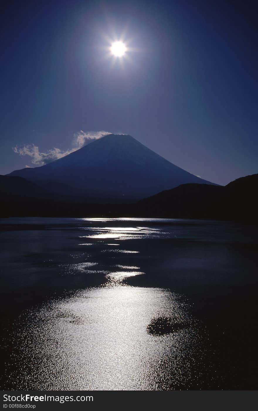 Mount Fuji with morning sun and sparkling lake. Mount Fuji with morning sun and sparkling lake