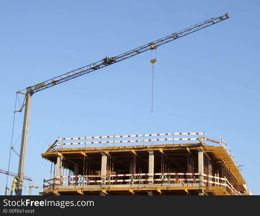 Crane on a construction site. Crane on a construction site