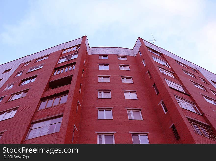 View of red brick block of flats typical for Russian cities. View of red brick block of flats typical for Russian cities