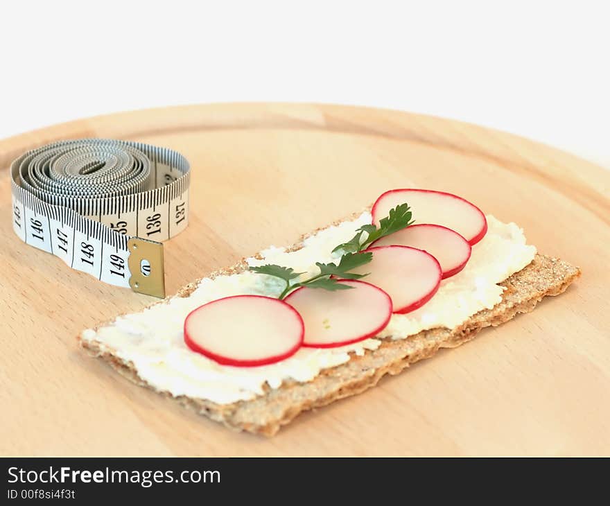 Composition of ligh  sandwich and tape measure. Composition of ligh  sandwich and tape measure