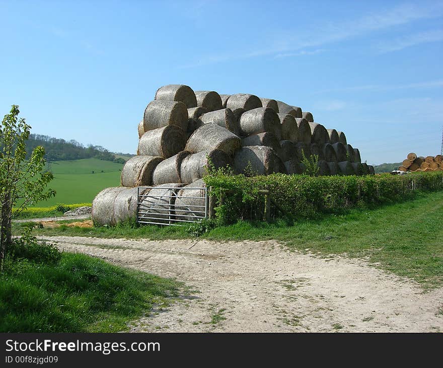 stack of rolled bales in farmers field. stack of rolled bales in farmers field