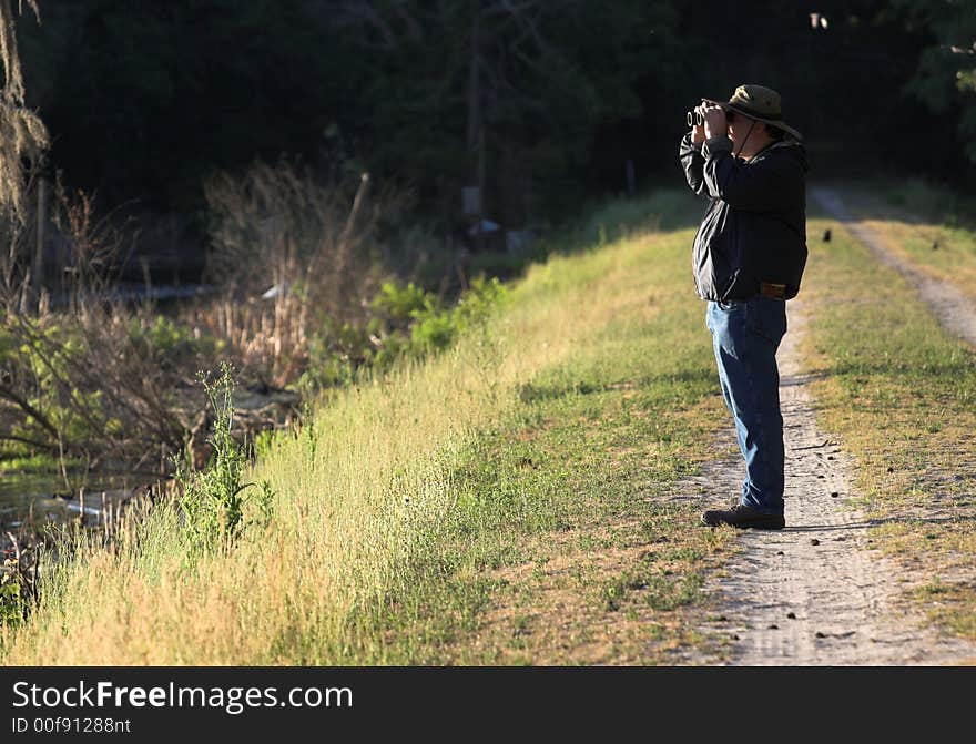 Man with binoculars