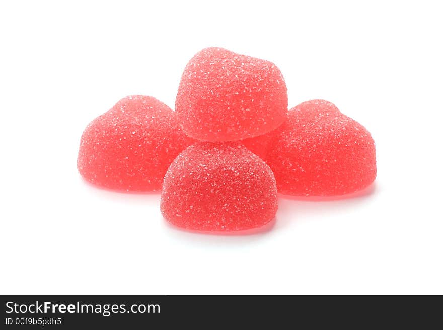 Strawberry heart-shaped jellies isolated on white background. Strawberry heart-shaped jellies isolated on white background.