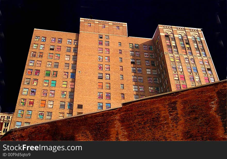 An abandoned building in Detroit with every window painted with a Mayan theme.  The painting have since been washed off.  The artist is unknown. An abandoned building in Detroit with every window painted with a Mayan theme.  The painting have since been washed off.  The artist is unknown.