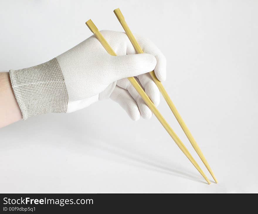 Man hands with chopsticks