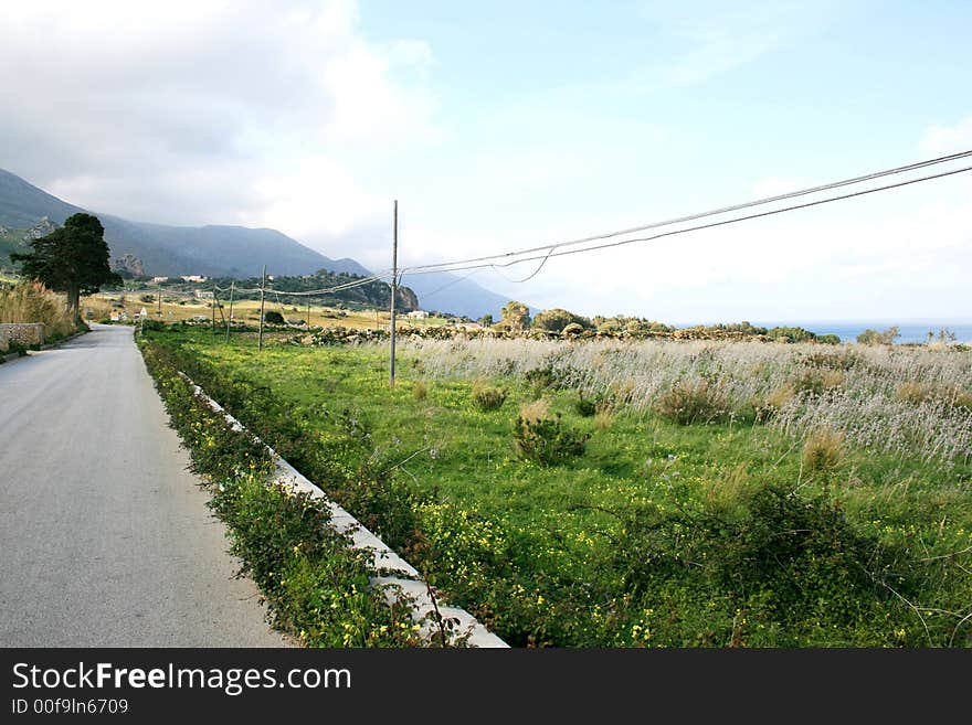 Road, Driving in the green gold Country. Summer travel background. Sicily. Road, Driving in the green gold Country. Summer travel background. Sicily