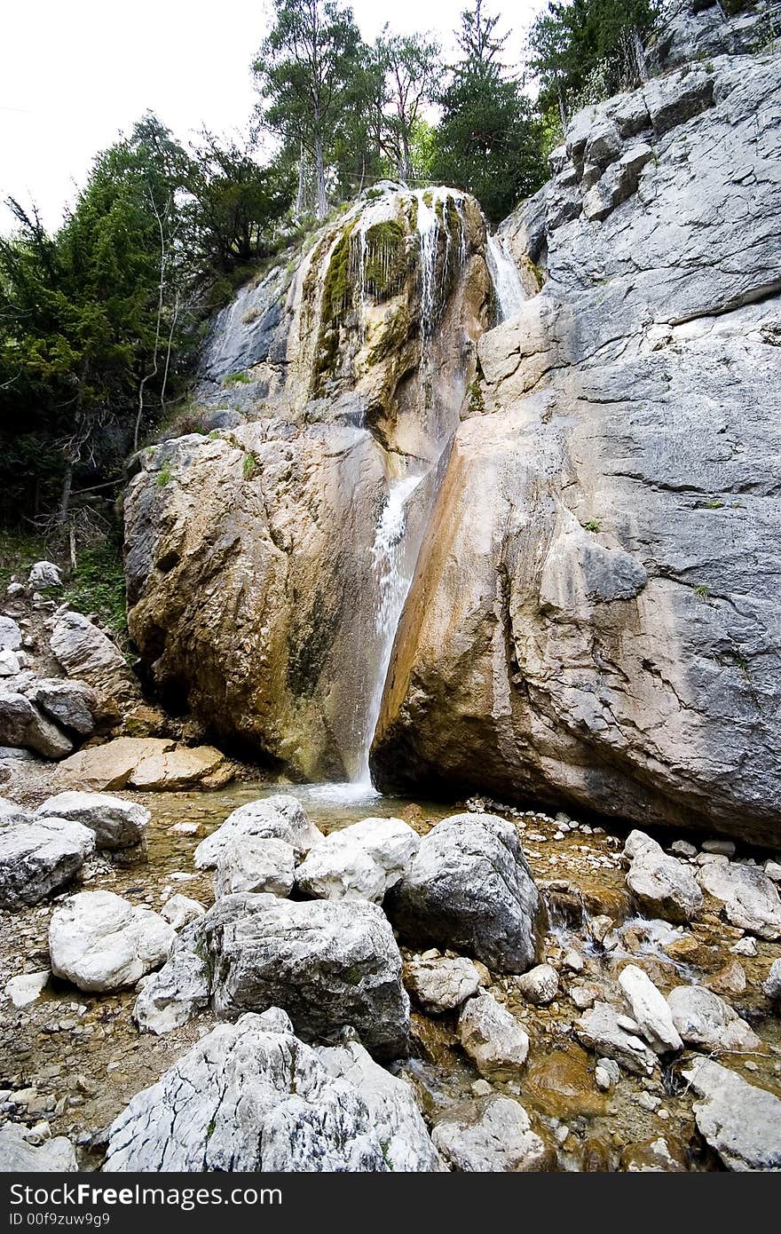 Little waterfall between big rocks