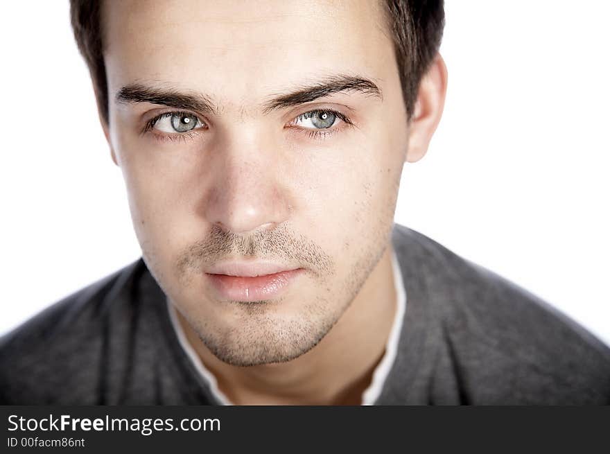 Smiling attractive young man on plain background. Smiling attractive young man on plain background