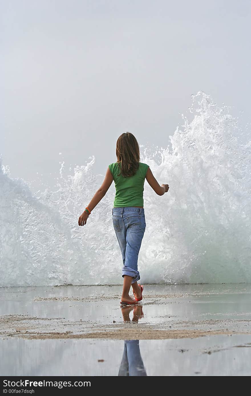 Photo of a girl with wave splash