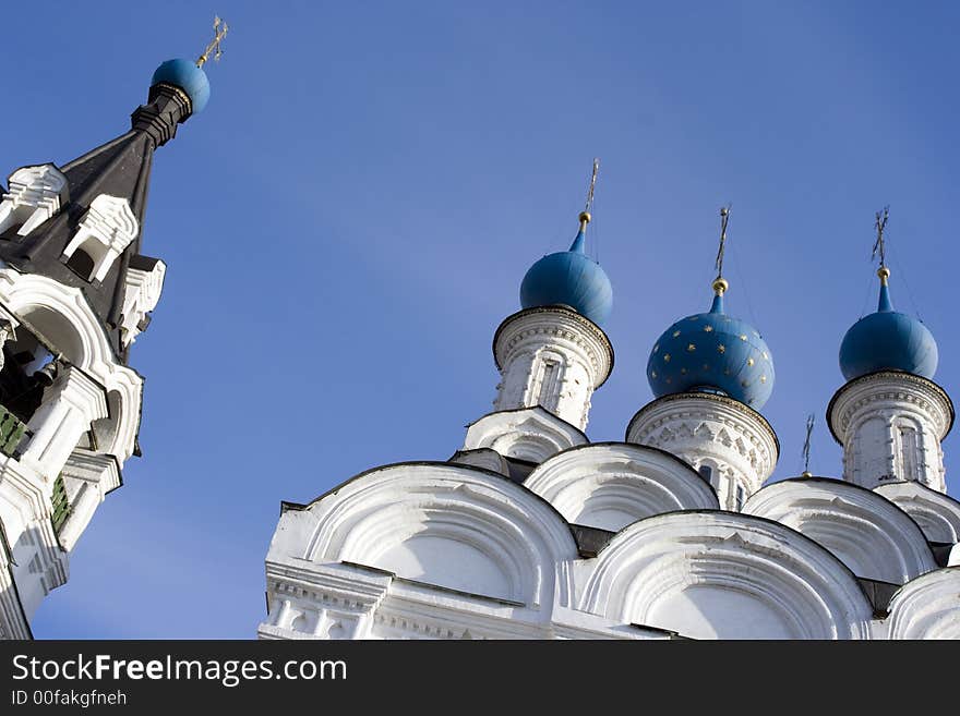 Orthodox church of a man's monastery in the dark blue sky in the solar morning, Russia, Murom/. Orthodox church of a man's monastery in the dark blue sky in the solar morning, Russia, Murom/