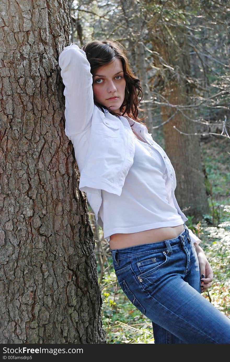 Beautiful woman posing in forest