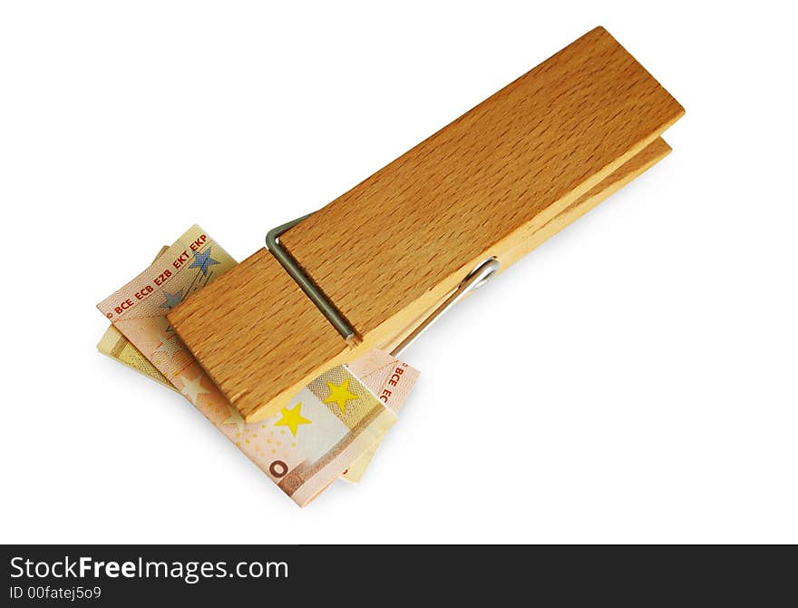 The wooden clothespin holds money