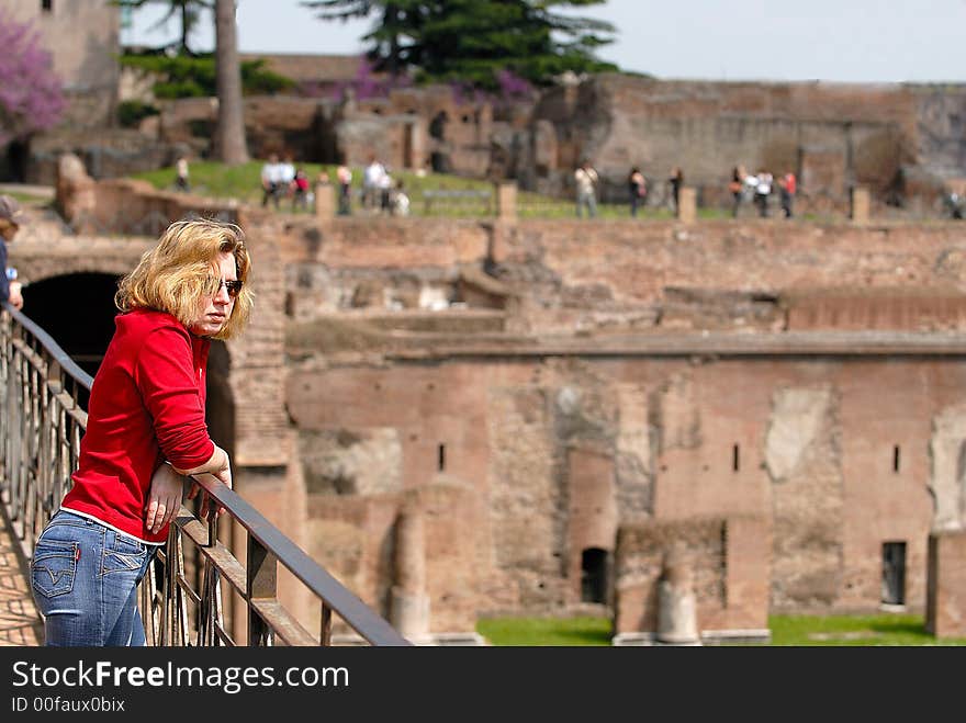 Young woman on the Palatin hill near the ruins. Young woman on the Palatin hill near the ruins