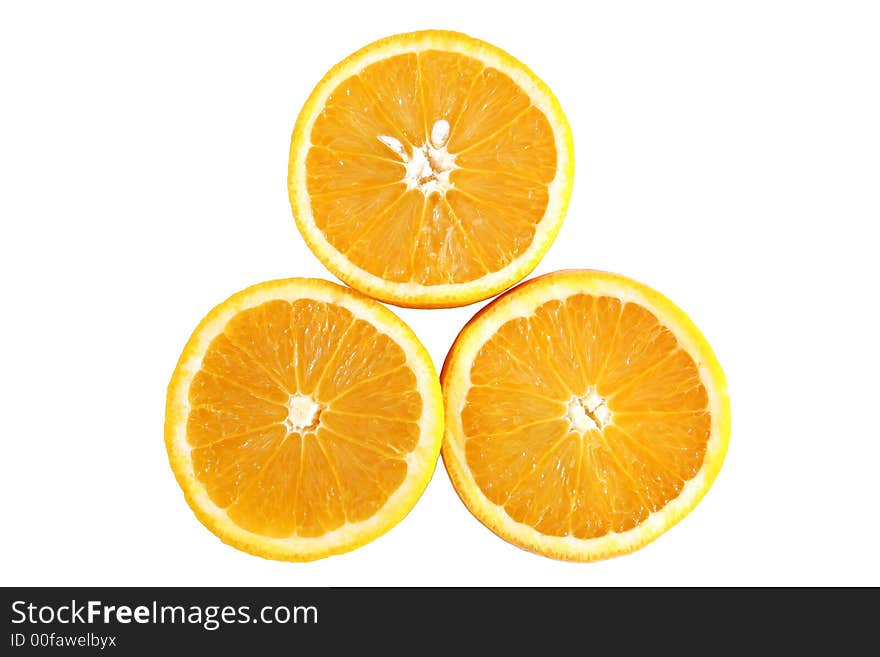 The inside of three juicy oranges