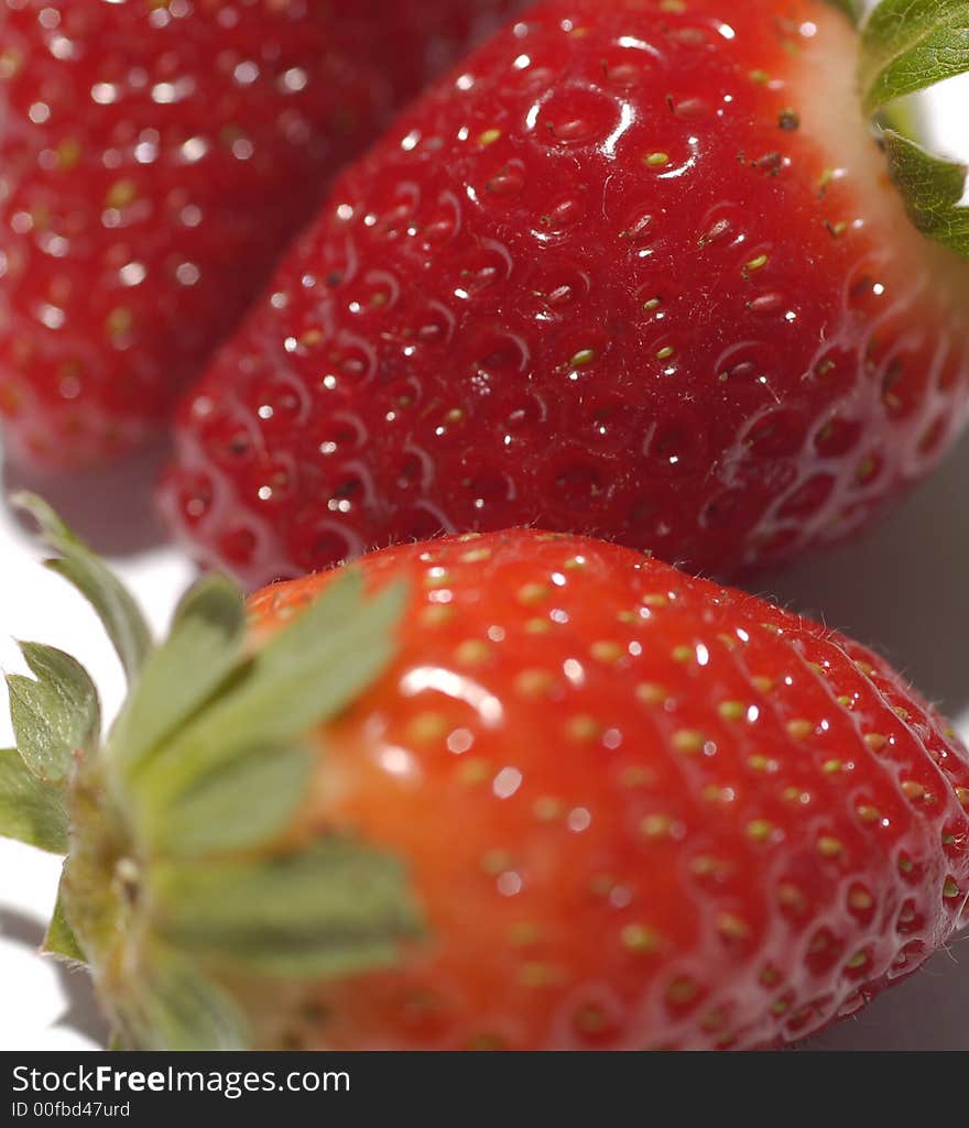 Closed up of fresh strawberry showing texture and colours