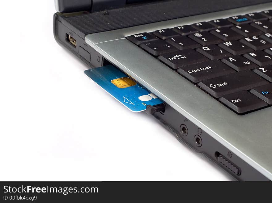 Credit card inserted in laptop