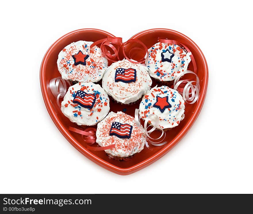 American theme cupcakes in a heart-shaped dish. American theme cupcakes in a heart-shaped dish.