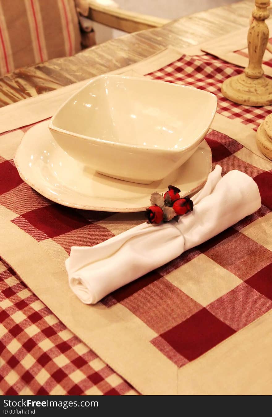 Red and cream decorated table setting