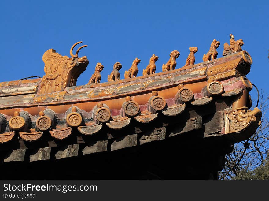 Imperial roof decoration of a building at the Forbidden City