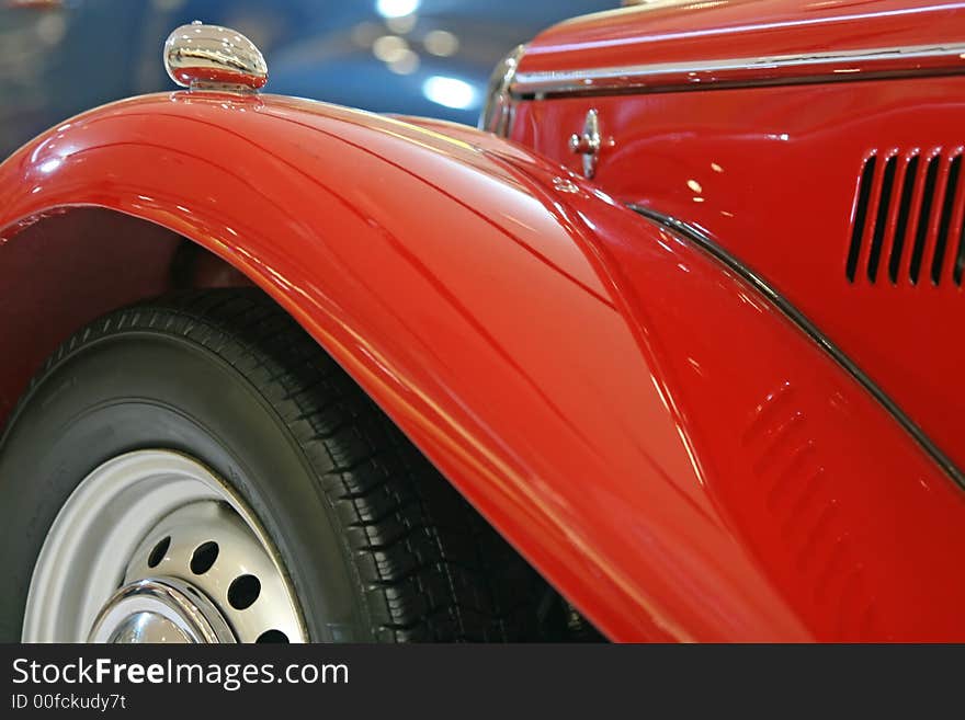 Close up of the wing of a classic old sports car. Close up of the wing of a classic old sports car