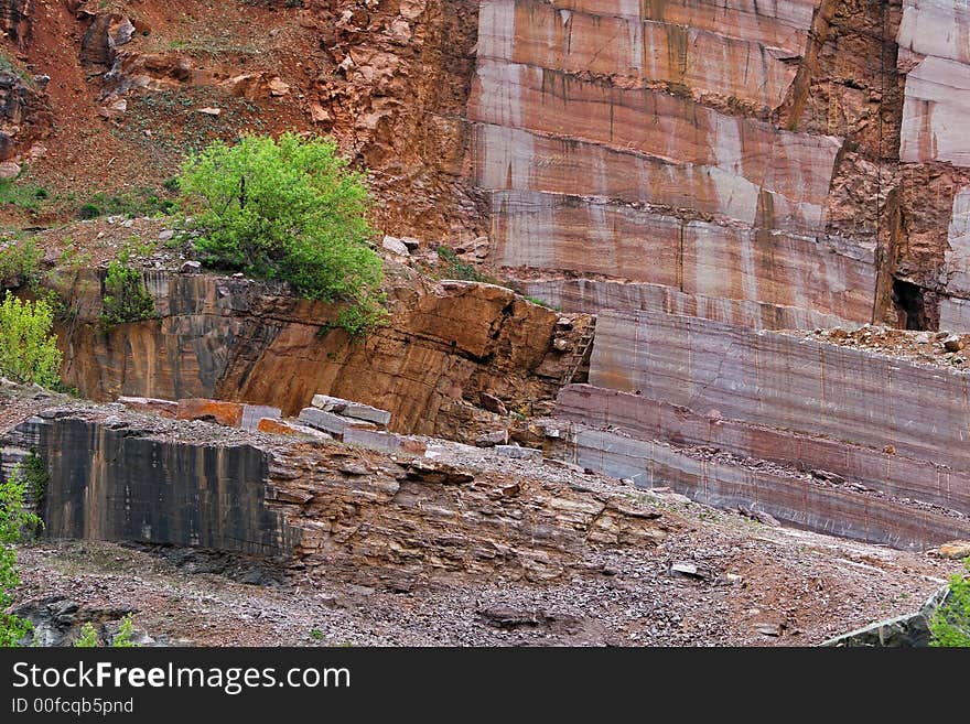 Red and black marble in an abandoned mine. Red and black marble in an abandoned mine