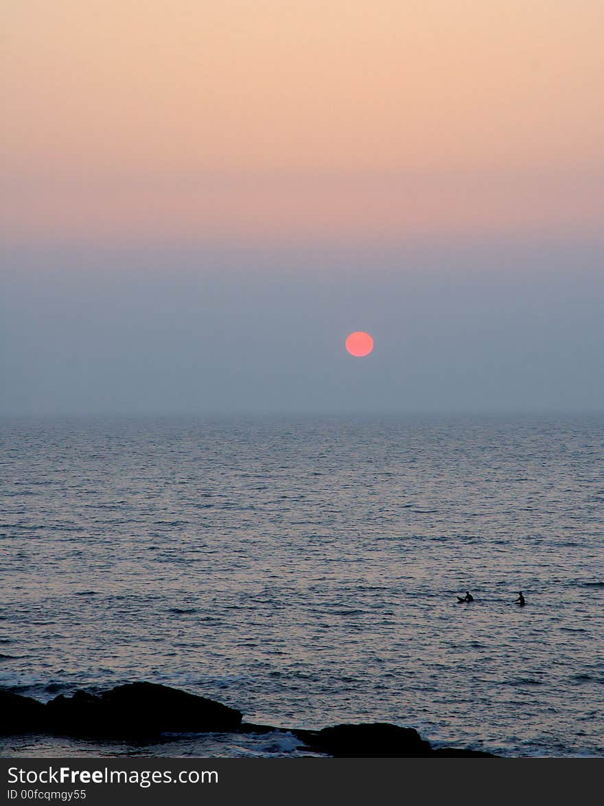 Surfer sunset