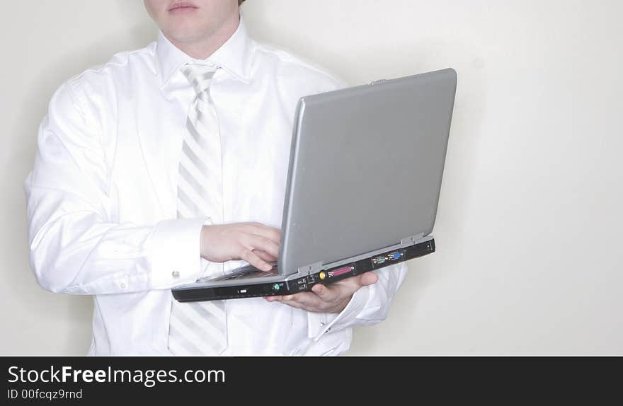 Businessman Holding Laptop