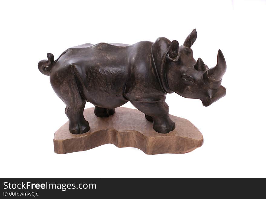 A wooden rhinocerus on white background