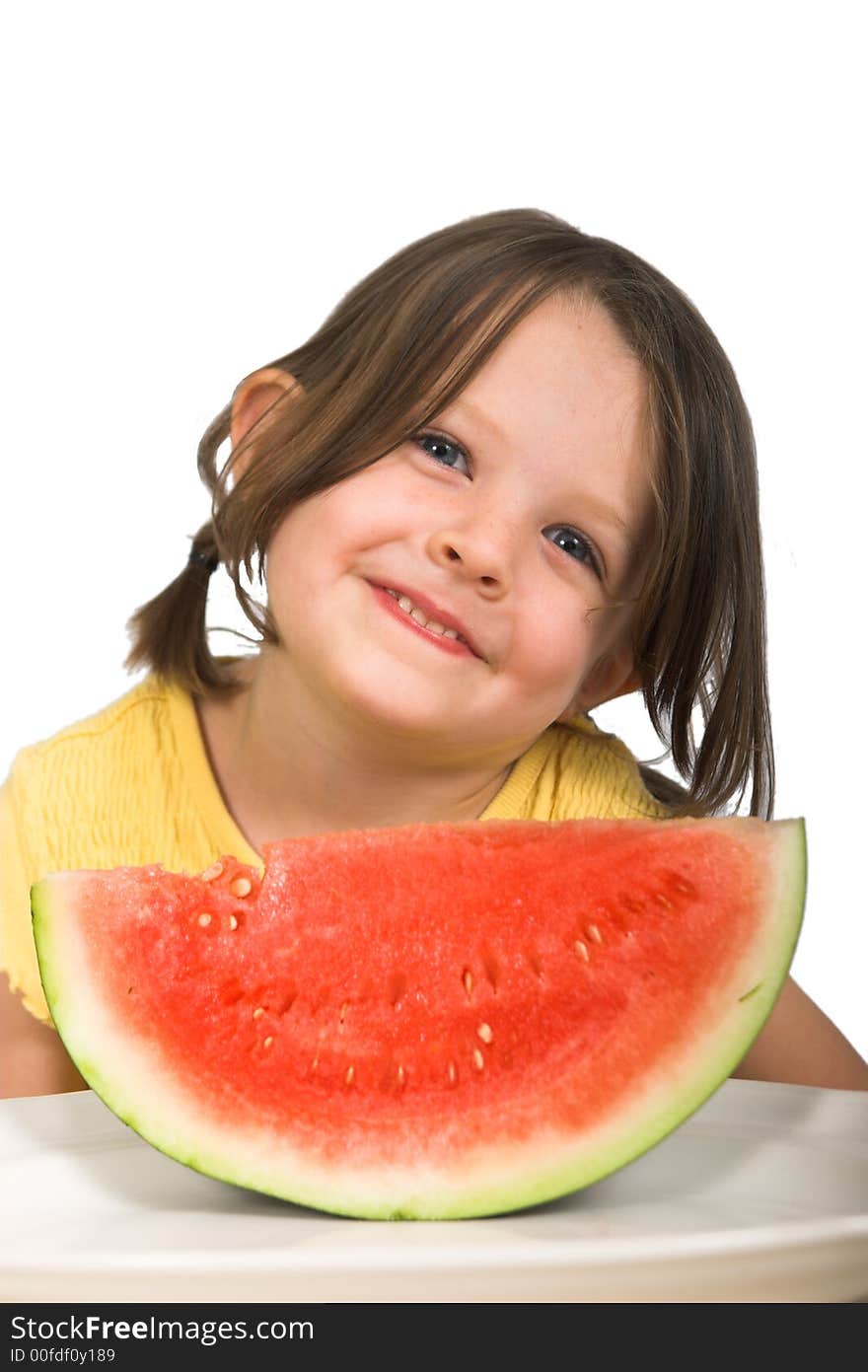 Little girl with delicious piece of watermelon, isolated over white. Little girl with delicious piece of watermelon, isolated over white