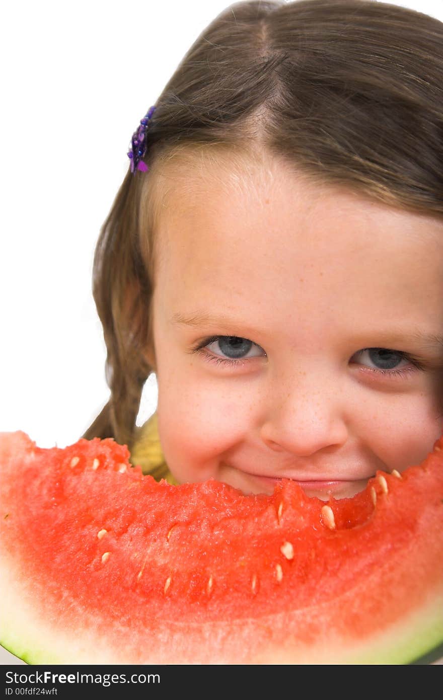 Little girl with delicious piece of watermelon, isolated over white. Little girl with delicious piece of watermelon, isolated over white