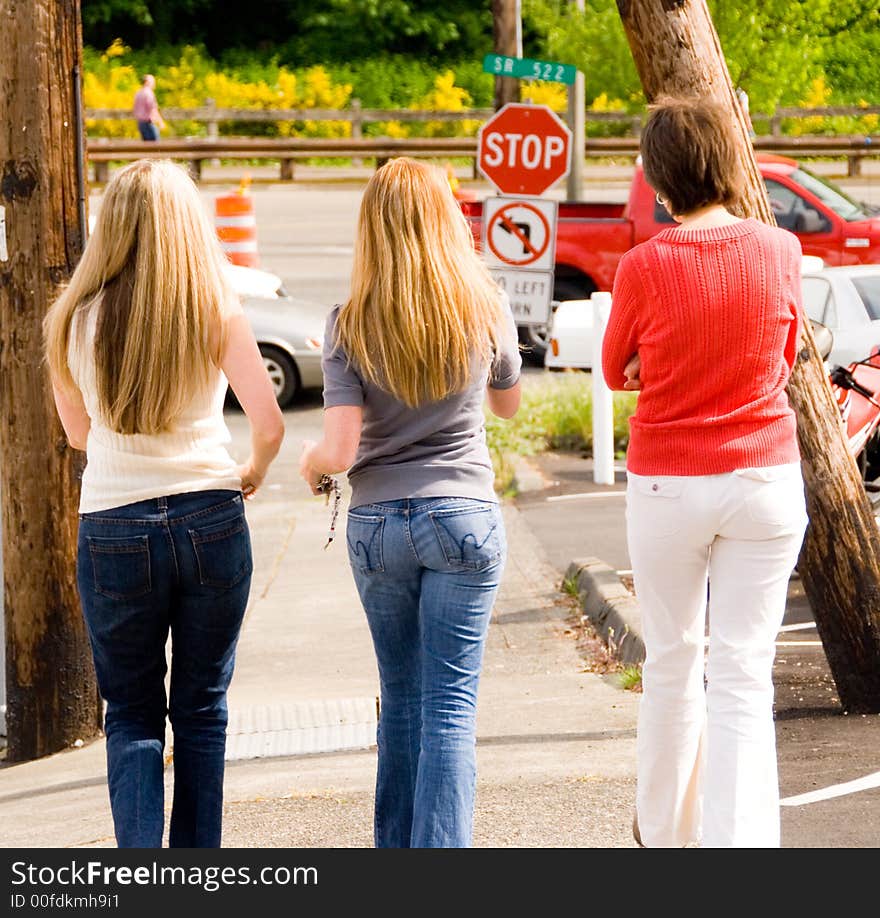 A group of three women on their way to see a concert by American Idol finalist Blake Lewis in Bothell, WA. A group of three women on their way to see a concert by American Idol finalist Blake Lewis in Bothell, WA