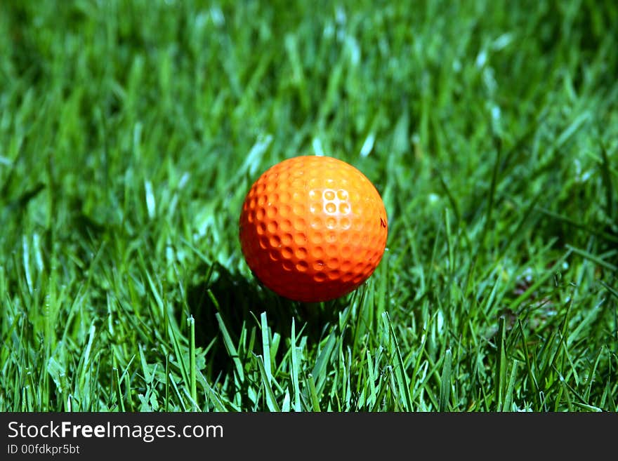 An orange golf ball