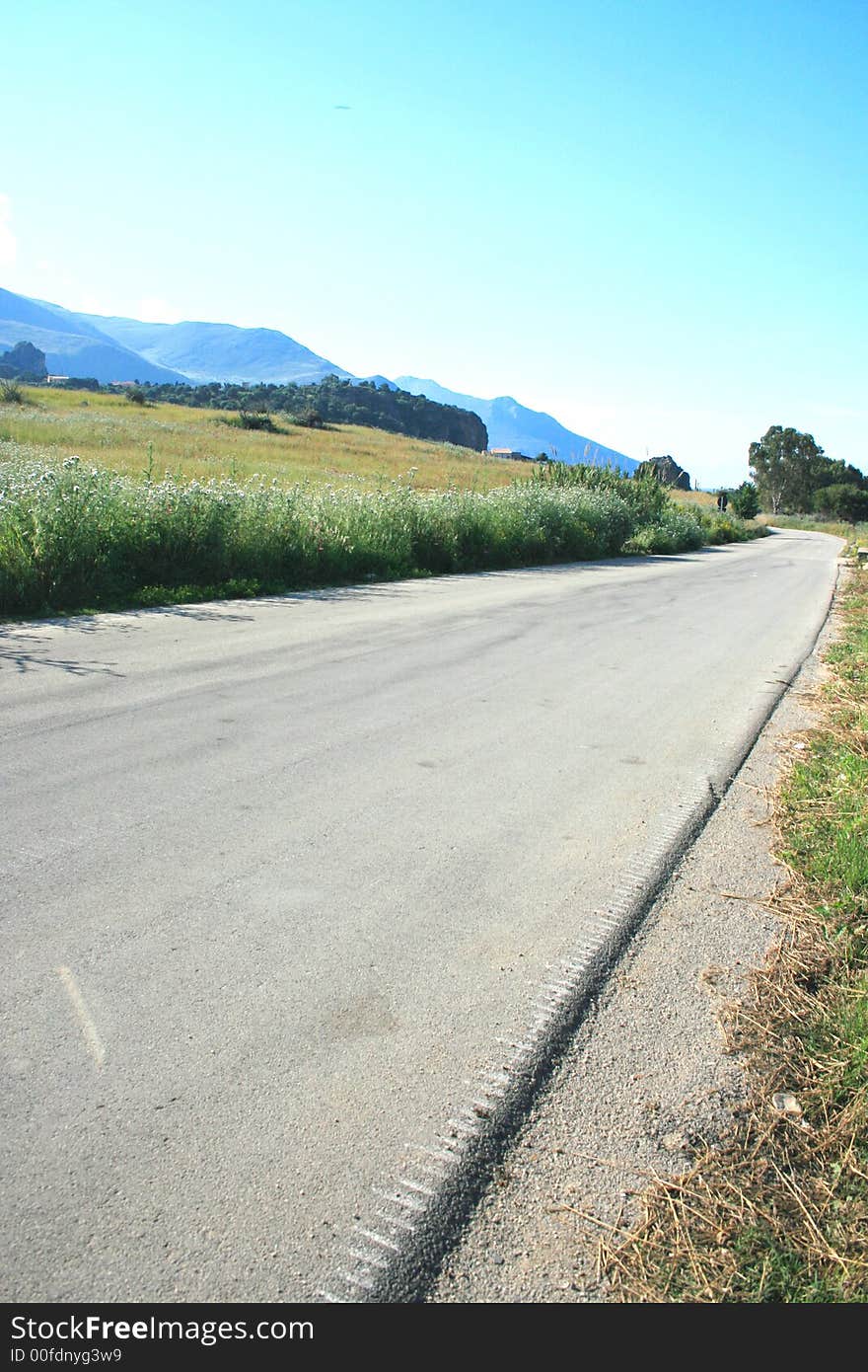 Road, Driving in the green gold Country. Summer travel background. Sicily. Road, Driving in the green gold Country. Summer travel background. Sicily