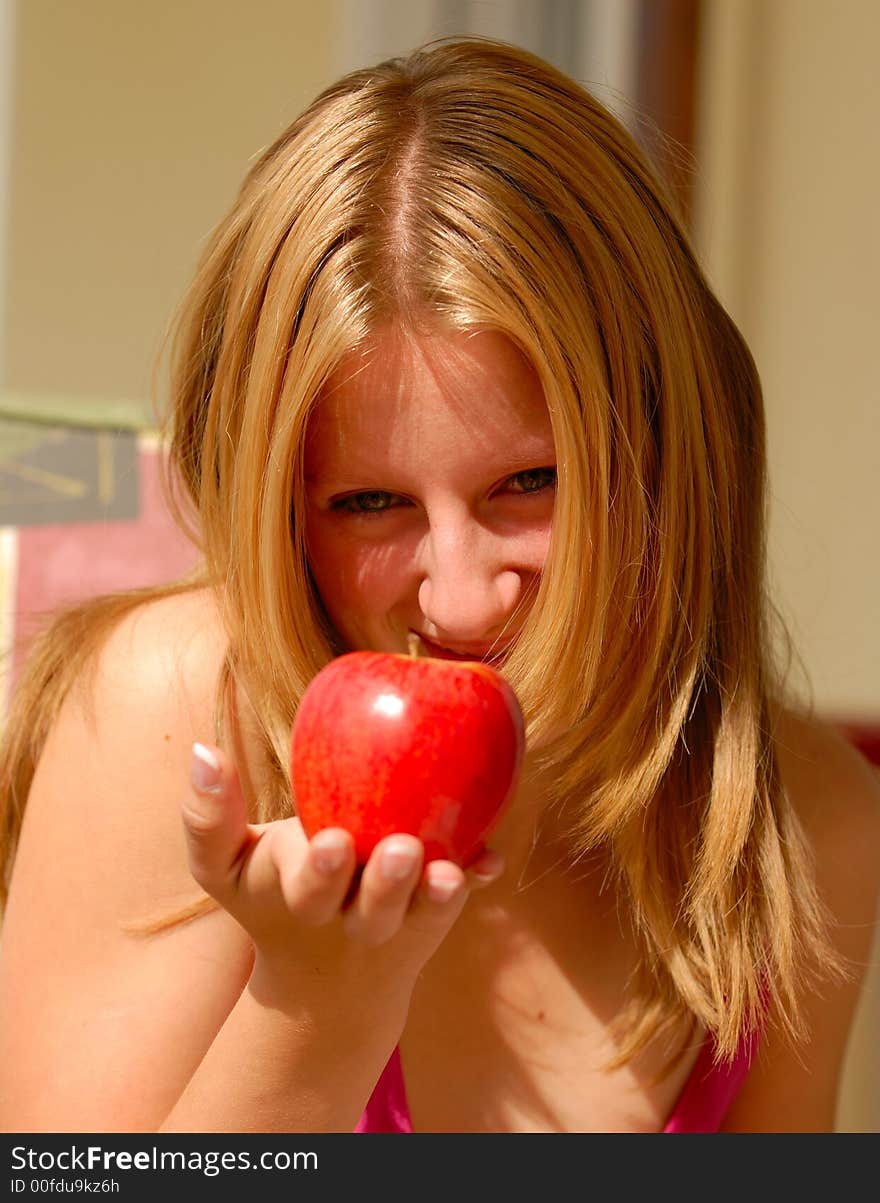 Young girl with the red apple. Young girl with the red apple