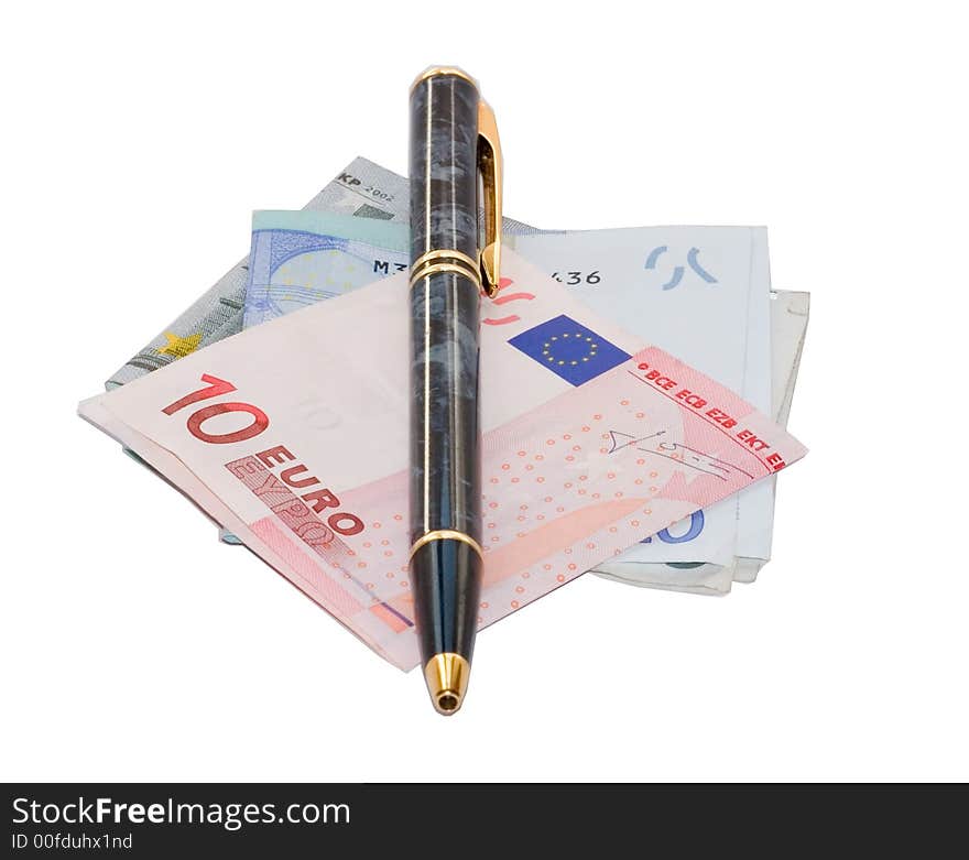 A bunch of Euro bills with a pen lying on top . A bunch of Euro bills with a pen lying on top .