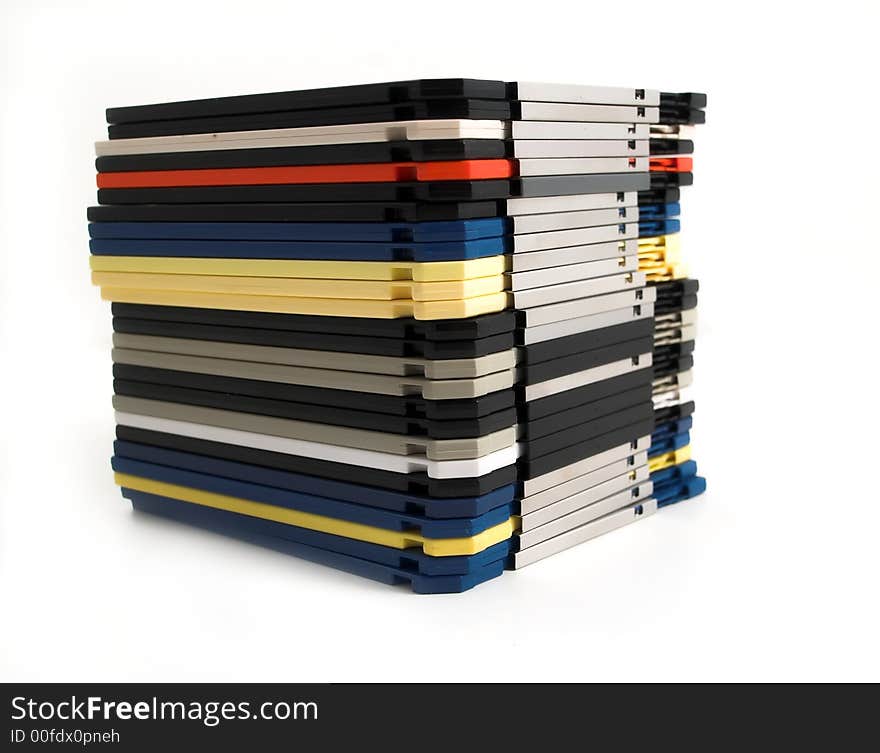 Close up of stack of floppy discs on white background