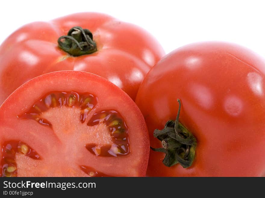 Fresh tomatoes over white background. Fresh tomatoes over white background