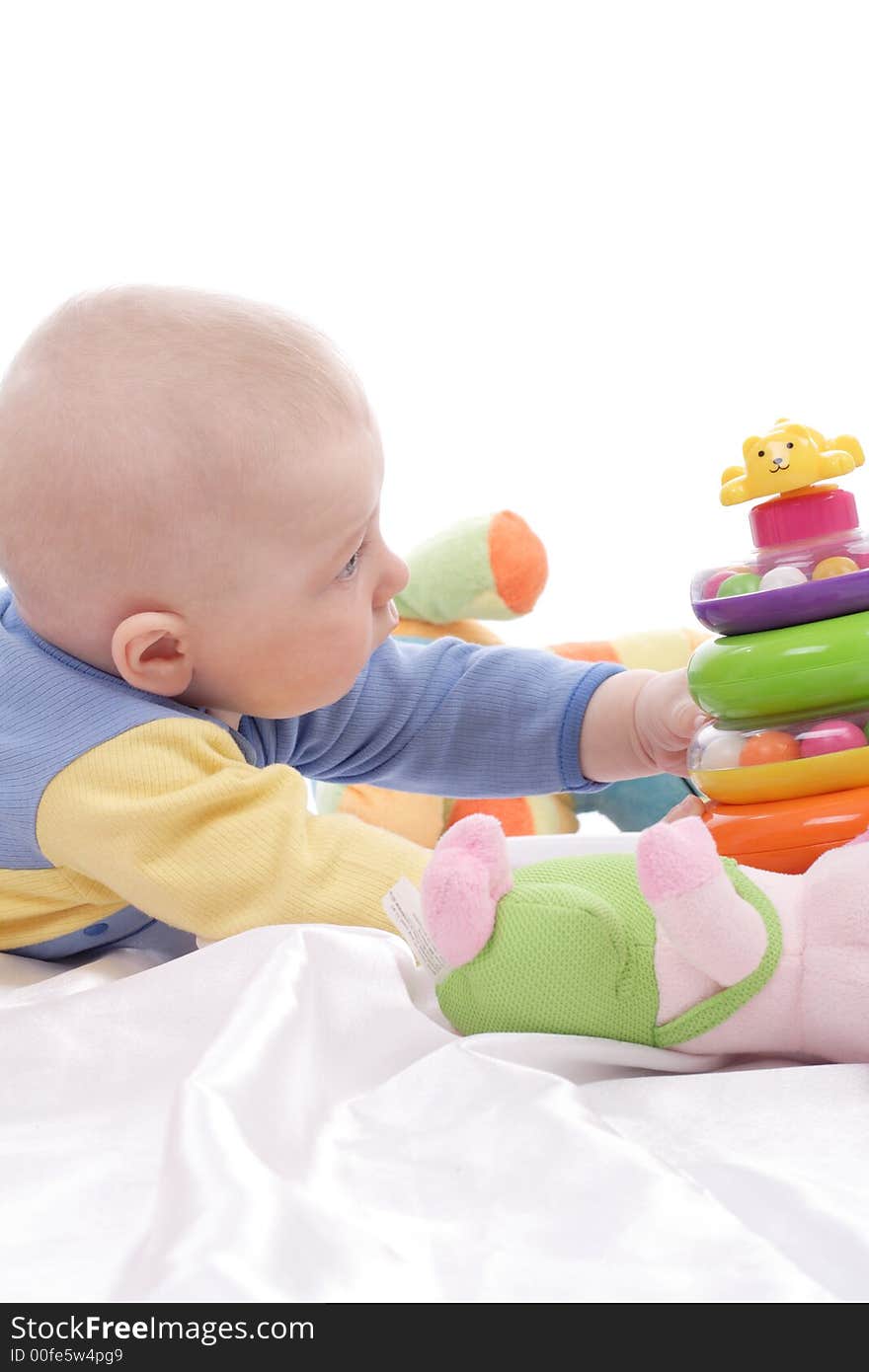 Beautiful baby. Shot in studio. Isolated on white. Beautiful baby. Shot in studio. Isolated on white.