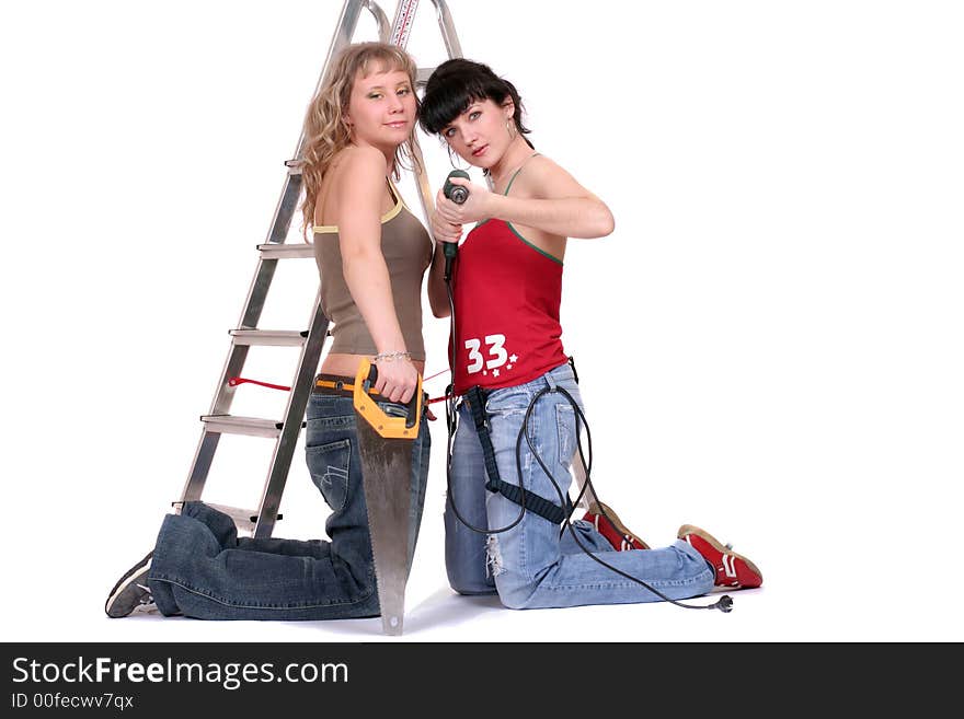 Two women with a tools  on white background. Two women with a tools  on white background