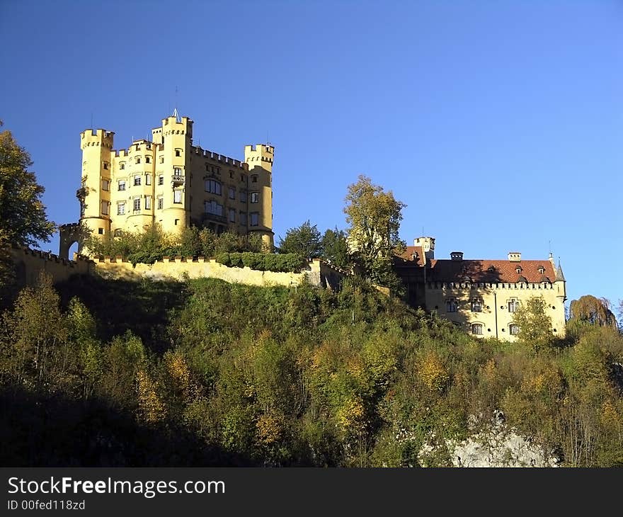 Royal castle Hohenschwangau, Bavaria, Germany. Blue sky in background.