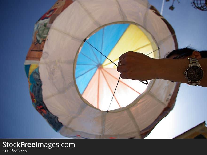 Artistic hot-air balloon in the medieval city, Italy.